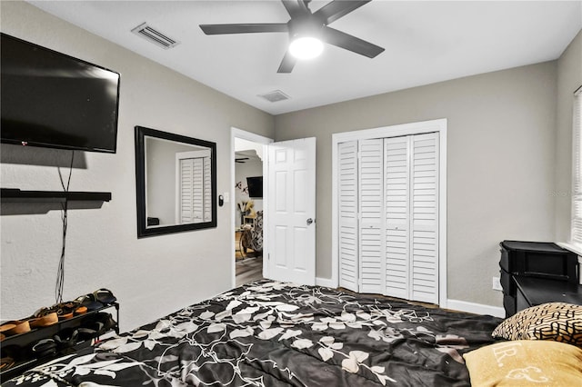 bedroom with a closet and ceiling fan