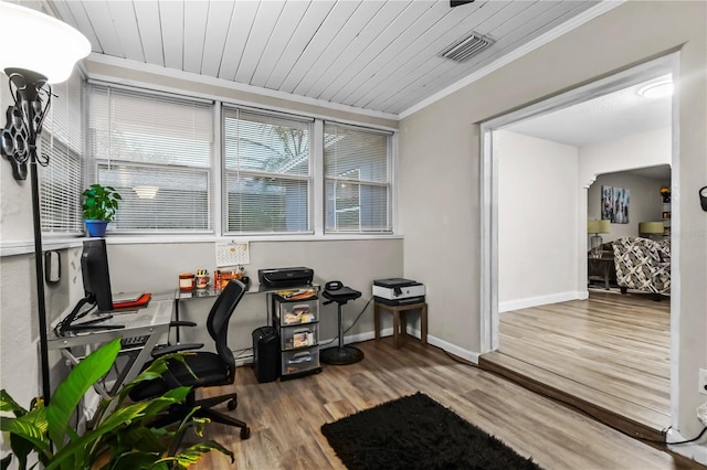 home office featuring wood finished floors, wood ceiling, visible vents, baseboards, and ornamental molding