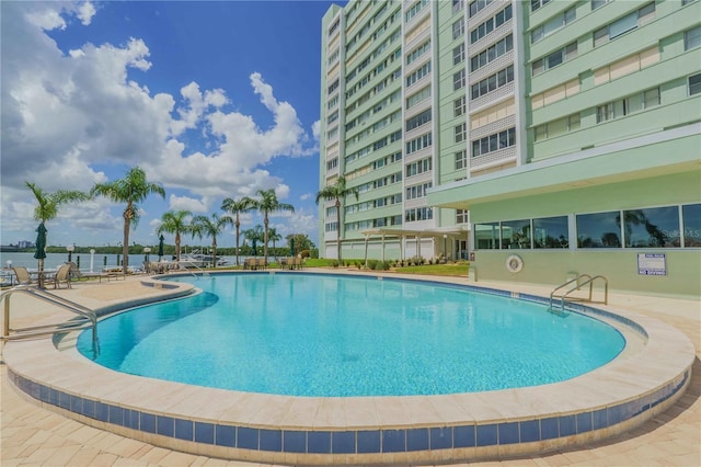 community pool featuring a patio area