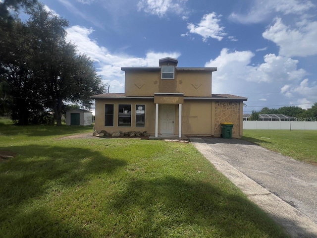 view of front of house with a front lawn