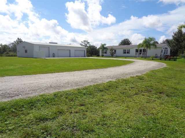 view of yard featuring a garage