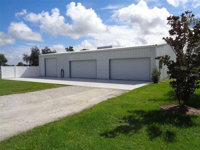 garage with a yard