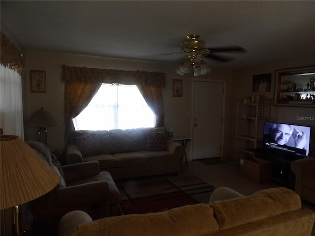 living area with ceiling fan