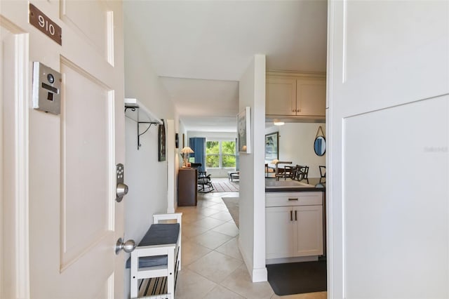 interior space with light tile patterned floors