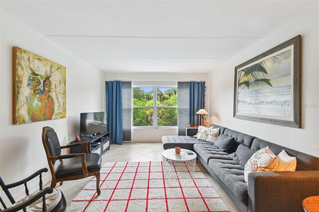 living room featuring light tile patterned flooring