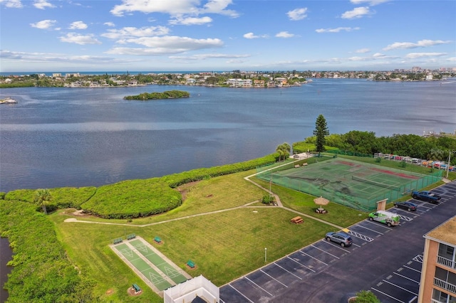 birds eye view of property featuring a water view