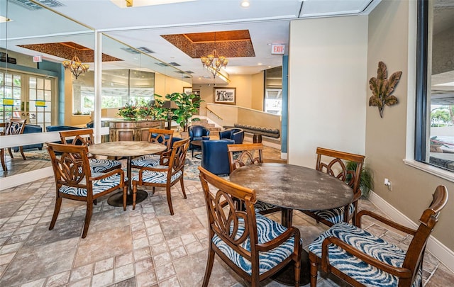 dining room with a chandelier