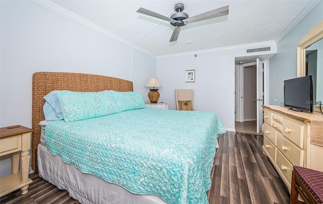 bedroom with crown molding, ceiling fan, and dark hardwood / wood-style floors