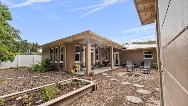 back of house featuring a patio