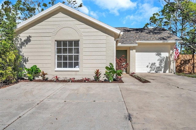 view of front of home with a garage