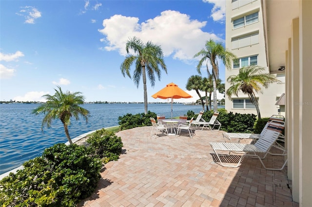 view of patio featuring a water view