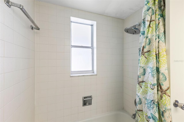 bathroom featuring shower / tub combo