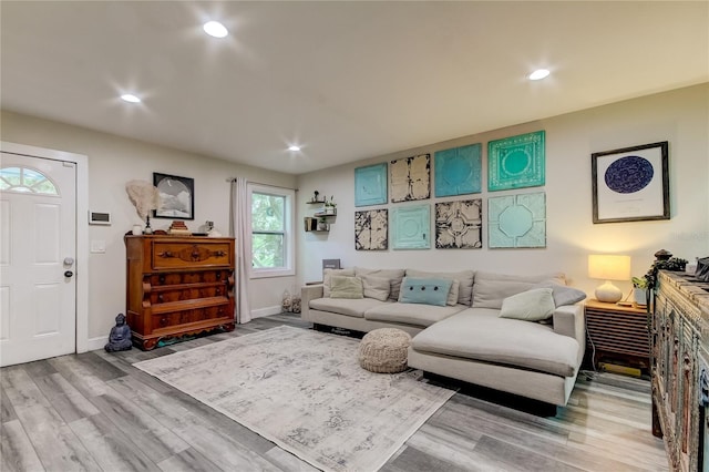 living room with light hardwood / wood-style floors