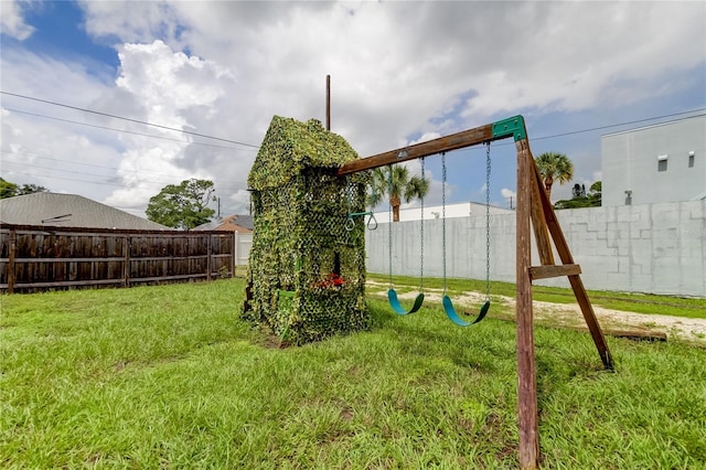 view of playground with a yard