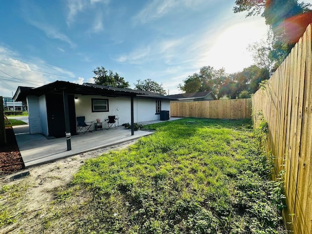 view of yard with a patio area