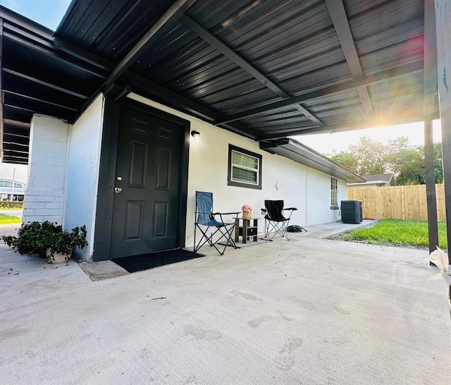 exterior space featuring a patio area and central AC