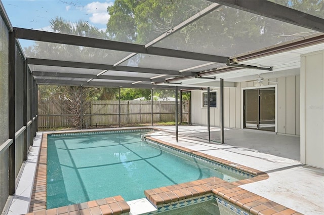 view of pool with a lanai and a patio area