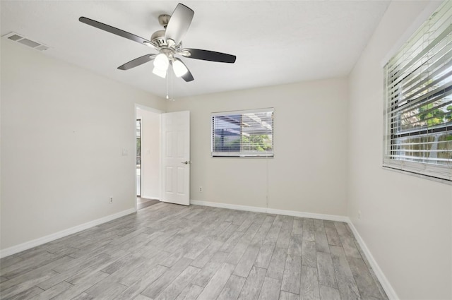 unfurnished room featuring ceiling fan and light hardwood / wood-style floors