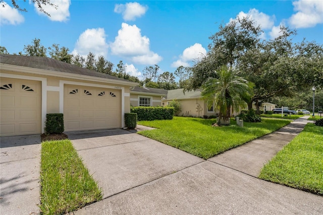 exterior space with a garage and a front yard