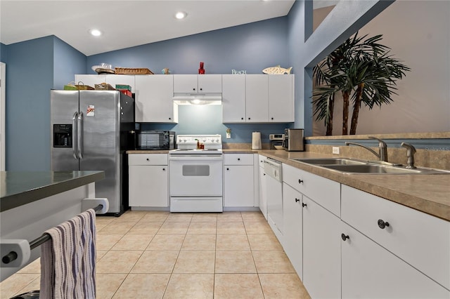 kitchen with white cabinetry, white appliances, light tile patterned floors, sink, and vaulted ceiling