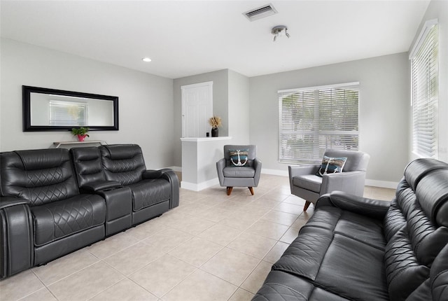 living room with light tile patterned flooring