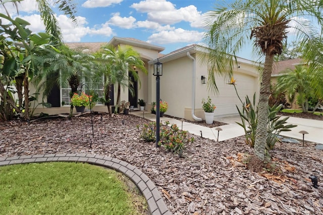 exterior space with a garage