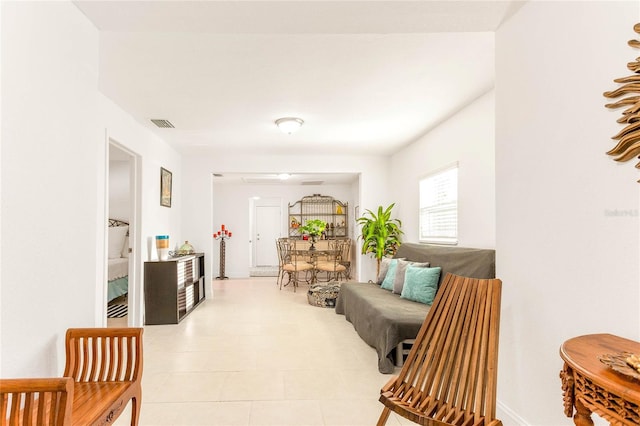 interior space featuring light tile patterned floors