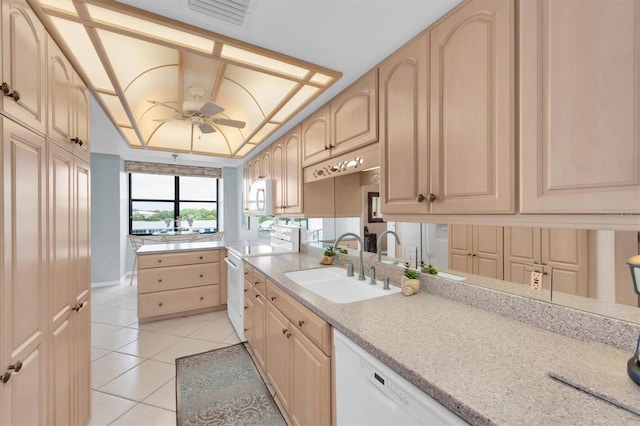 kitchen with white appliances, sink, light brown cabinets, ceiling fan, and light tile patterned flooring