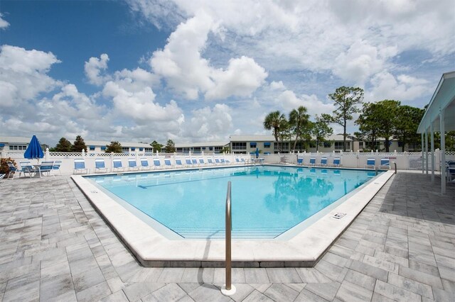 view of pool featuring a patio area