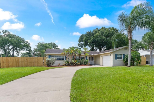 ranch-style house with a front lawn and a garage