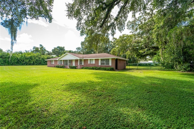 view of front of house with a front lawn