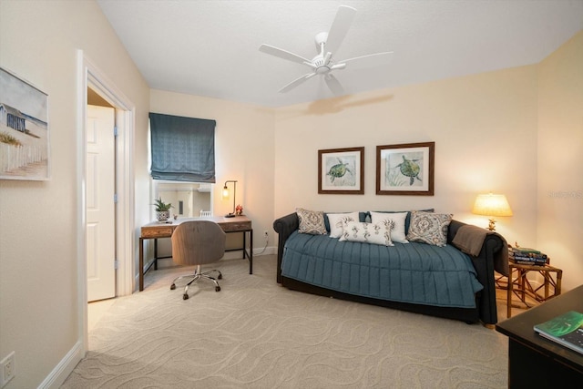 bedroom with carpet floors, a ceiling fan, and baseboards