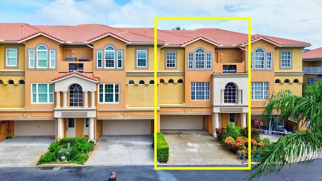 view of front of home with a garage