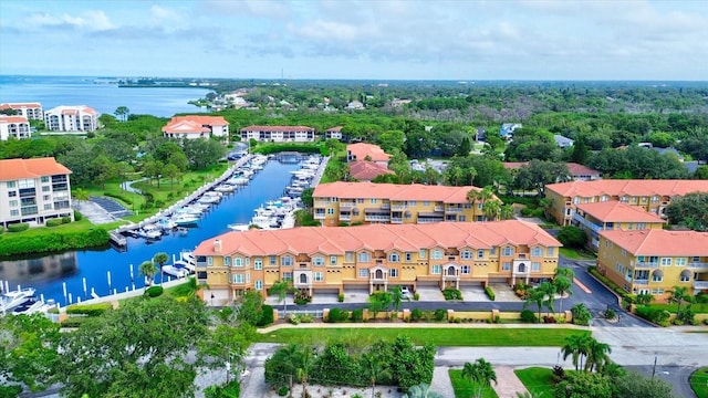 birds eye view of property featuring a water view