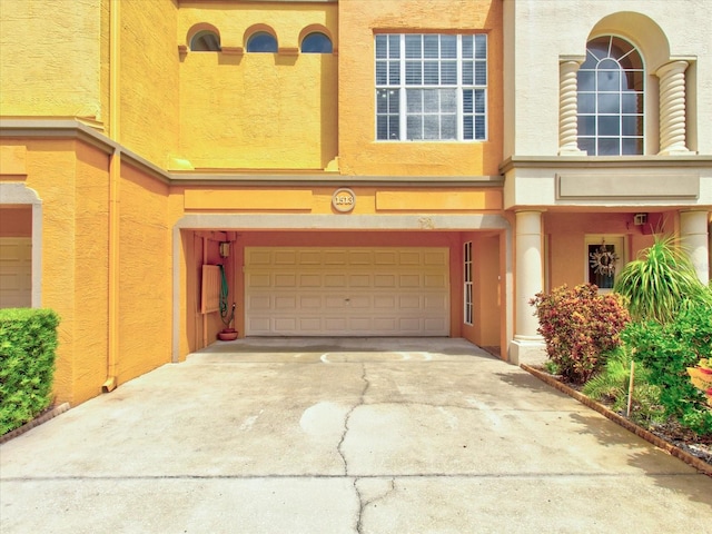 exterior space with a garage