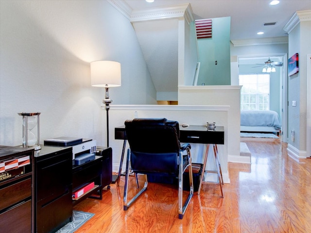 office featuring ornamental molding, hardwood / wood-style floors, and ceiling fan