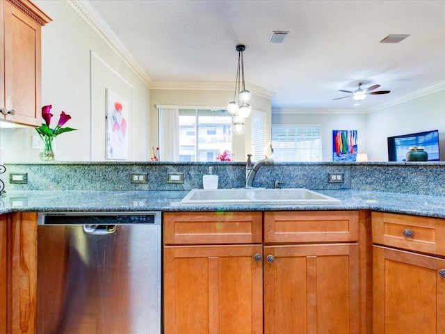 kitchen featuring crown molding, dishwasher, sink, ceiling fan, and stone countertops