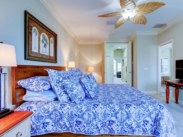 carpeted bedroom with ceiling fan and ornamental molding