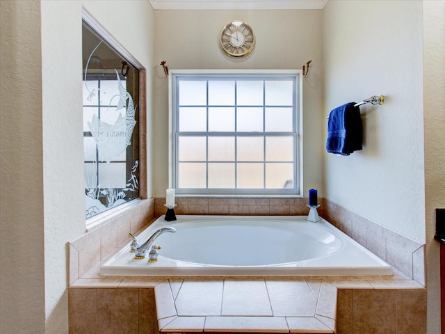 bathroom featuring tiled bath