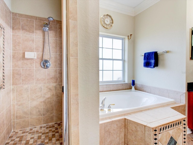 bathroom with crown molding and shower with separate bathtub