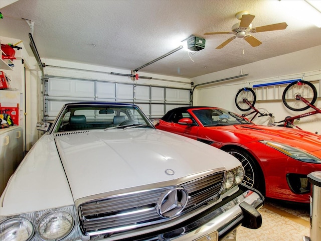 garage with ceiling fan and a garage door opener