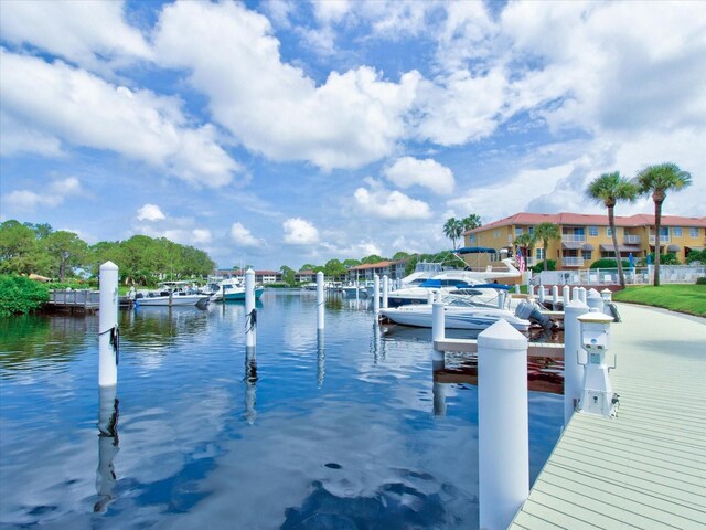 view of dock with a water view