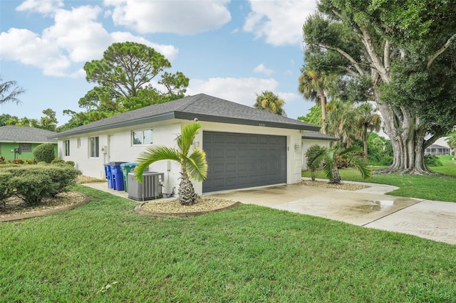 view of property exterior featuring cooling unit, a yard, and a garage