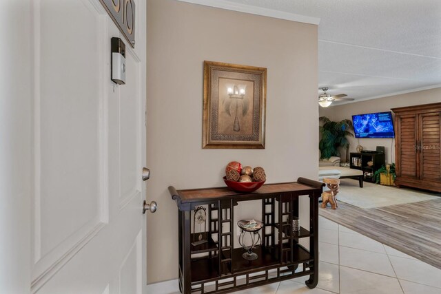 hallway featuring light tile patterned floors