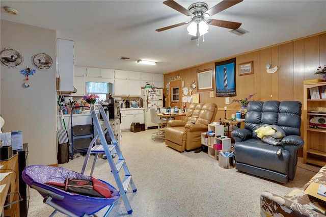 living room with ceiling fan