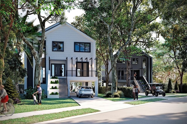 view of front of house with a front yard and a carport