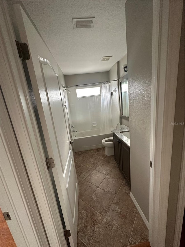 bathroom with visible vents, toilet, shower / bathtub combination with curtain, a textured ceiling, and vanity