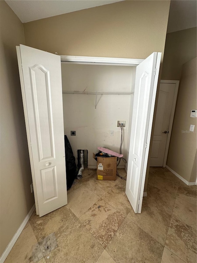 washroom with laundry area, washer hookup, electric dryer hookup, and baseboards