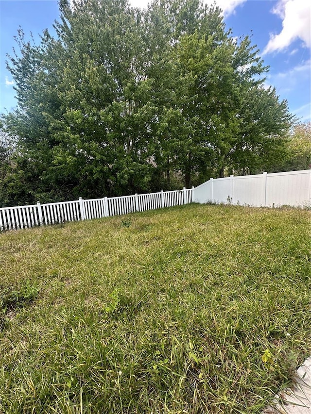 view of yard featuring fence