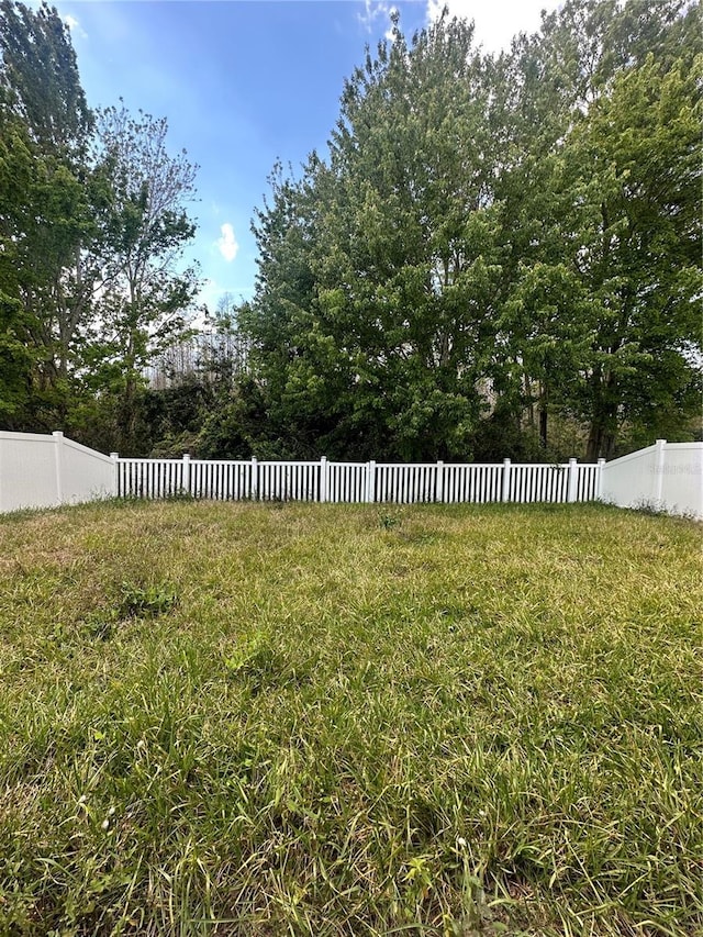 view of yard with fence